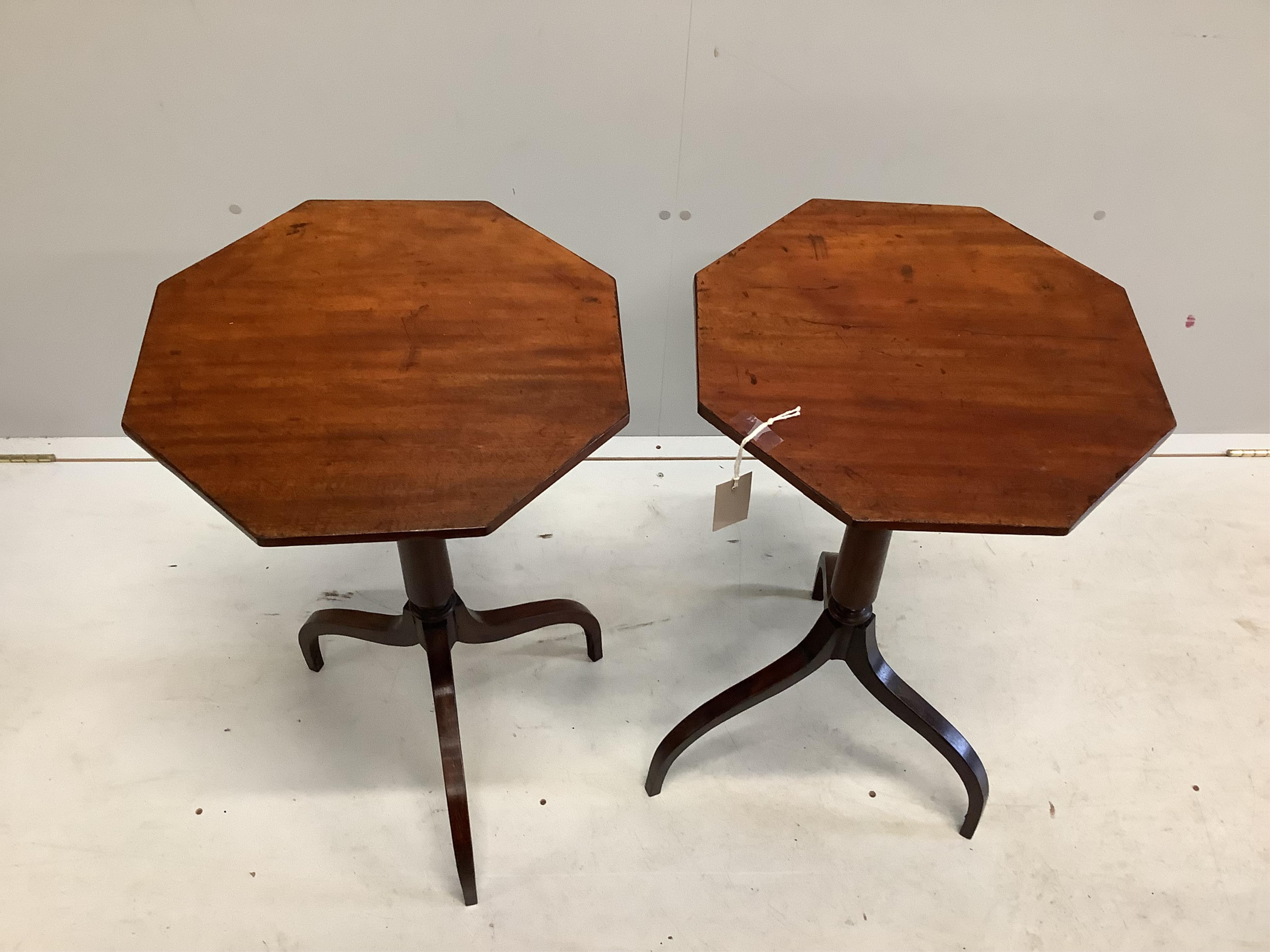 A pair of Regency style octagonal mahogany tripod wine tables, width 41cm, height 72cm. Condition - fair